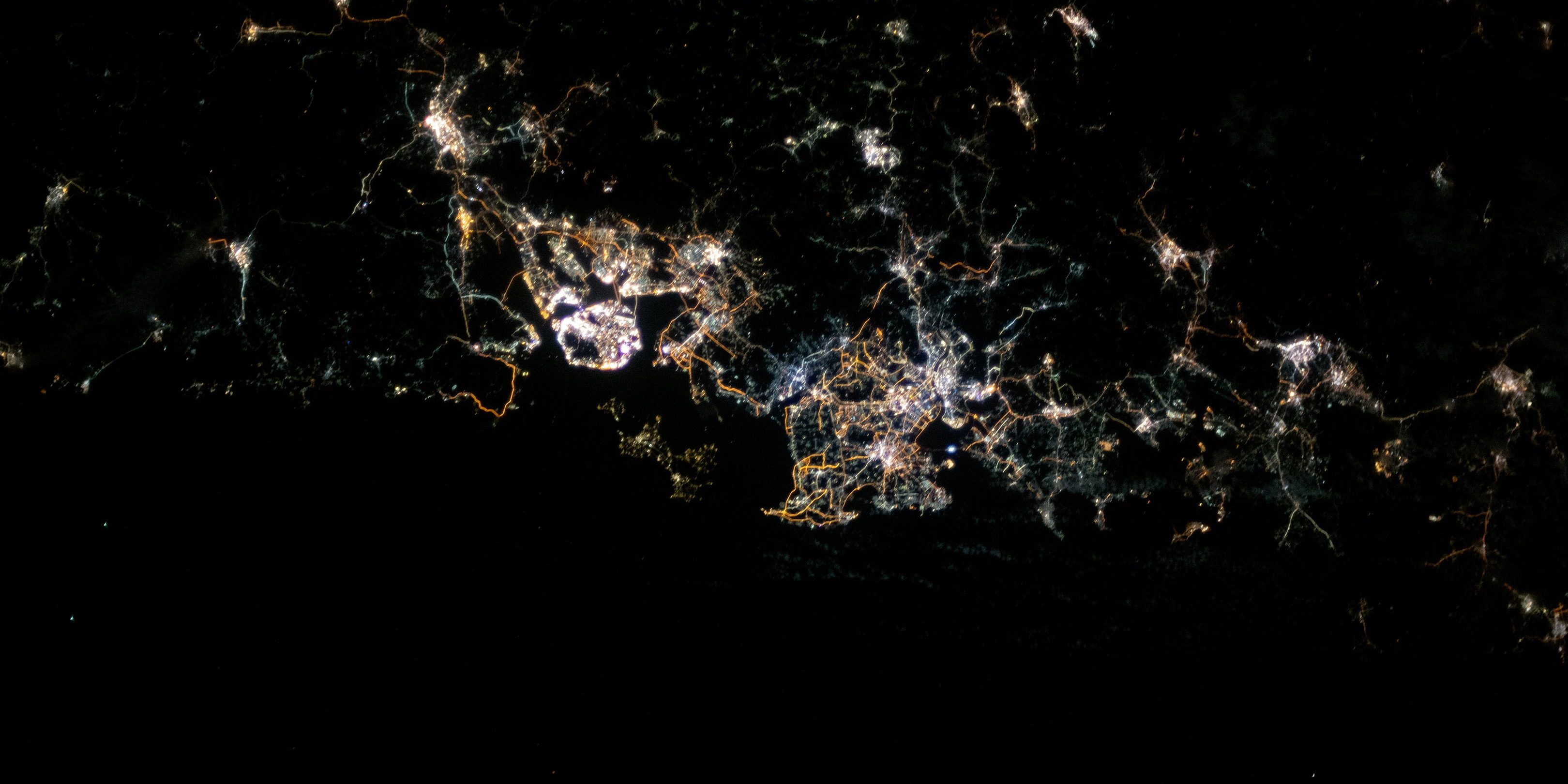 Image depicting city photos from space sent by astronauts from ISS