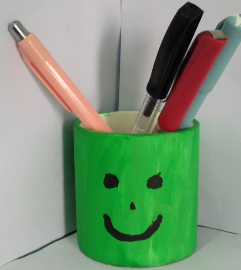 Image depicting recycle, best out of waste, pen holder