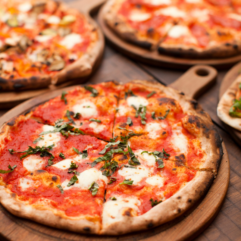 Image depicting This vending machine in Rome gives out hot pizza