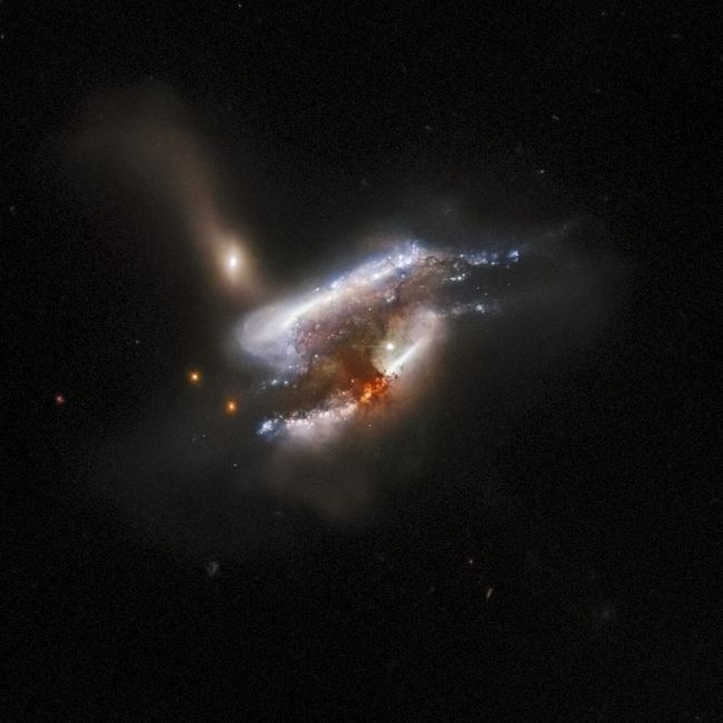 Image depicting Hubble Captures Merging Galaxies