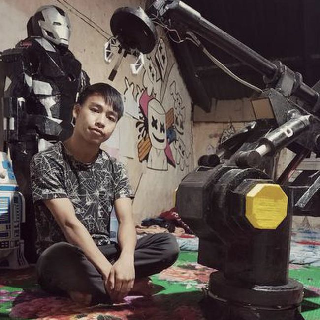 Image depicting Manipur boy builds robots from discarded metal!
