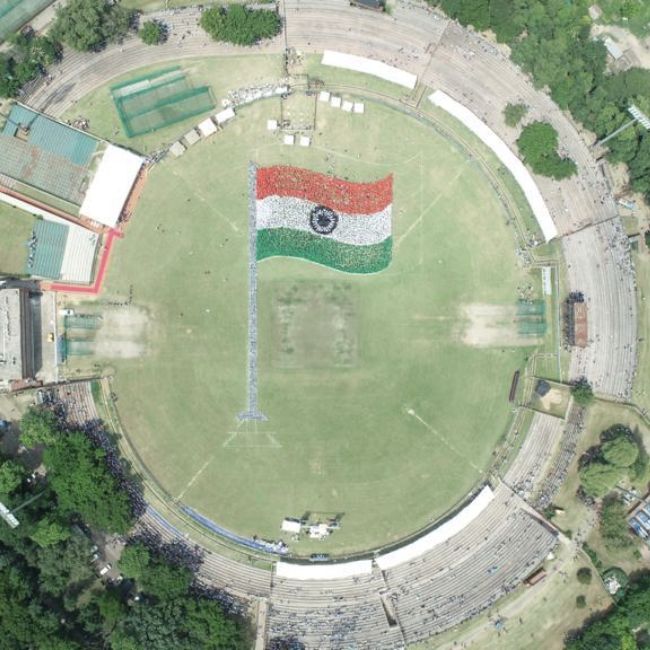 Image depicting See the largest human image of a waving Indian national flag!