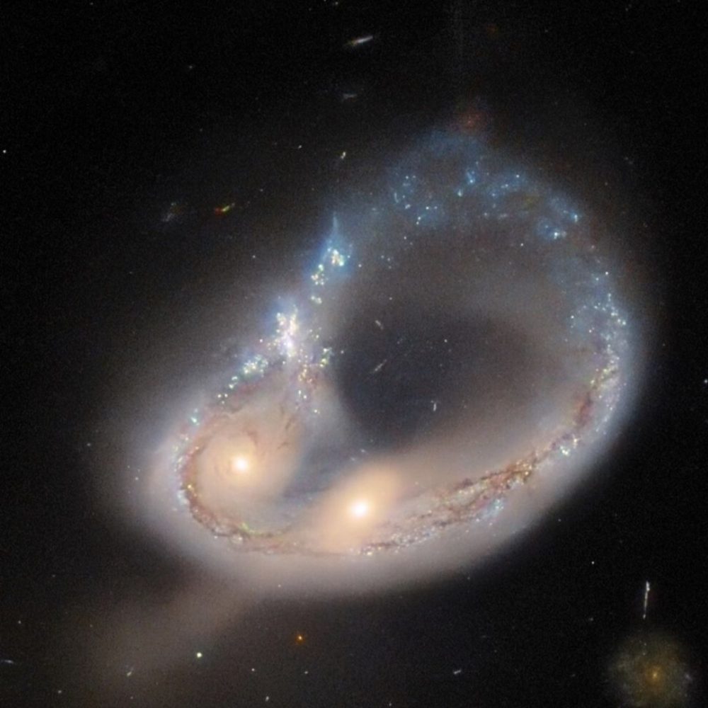 Image depicting Hubble captures galaxy collision!